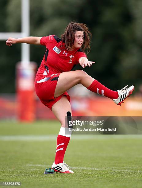 Robyn Wilkins of Wales kicks to convert a try during the IRB Women's Rugby World Cup Pool C match between Wales and South Africa at the French Rugby...