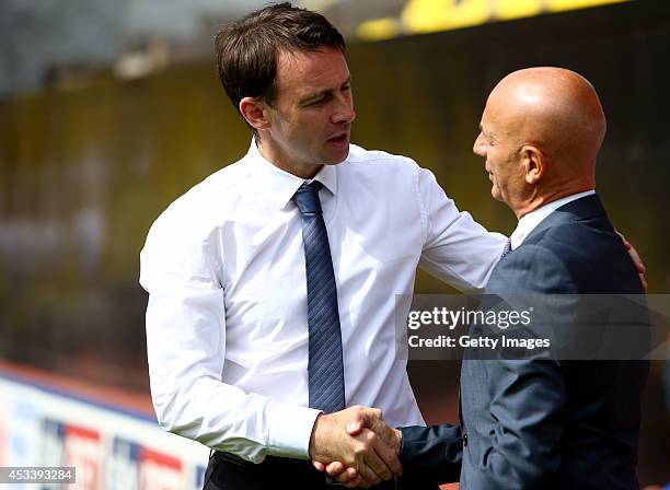 Dougie Freedman manager of Bolton Wanderers greets Bebbe Sannino manager of Watford before the Sky Bet Championship match between Watford and Bolton...