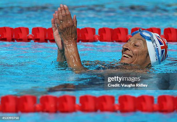 Jane Asher of Great Britain competes in the Women's 400m Freestyle during the 15th FINA World Masters Championships at Parc Jean-Drapeau on August 9,...