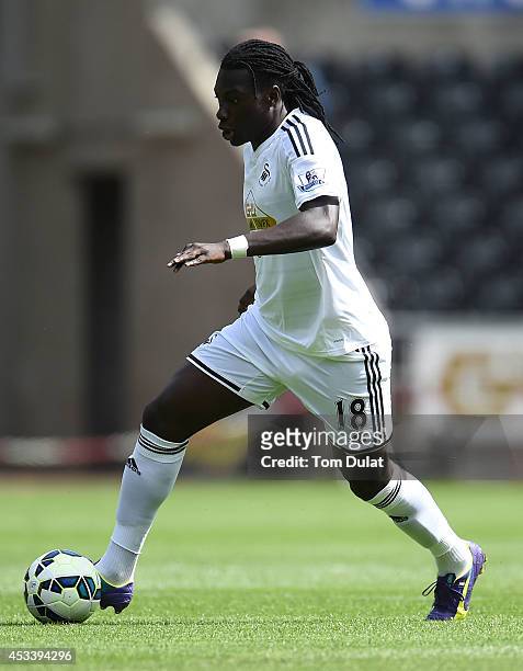 Bafetimbi Gomis of Swansea City in action during a pre season friendly match between Swansea City and Villarreal at Liberty Stadium on August 09,...