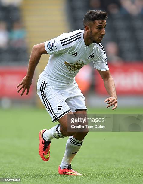 Neil Taylor of Swansea City in action during a pre season friendly match between Swansea City and Villarreal at Liberty Stadium on August 09, 2014 in...
