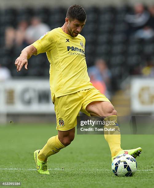 Bojan Jokic of Villarreal in action during a pre season friendly match between Swansea City and Villarreal at Liberty Stadium on August 09, 2014 in...