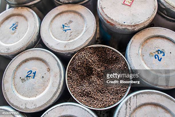 Canisters of tea samples sit at the Santosh Tea Industries Pvt. Factory in Coonoor, Tamil Nadu, India, on Saturday, Nov. 30, 2013. India is the...
