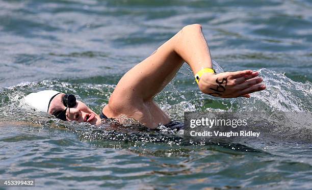 Leanne Rose of the U.S. Competes in the Women's 30-34 Age Group 3km swim during the 15th FINA World Masters Championships at Parc Jean-Drapeau on...