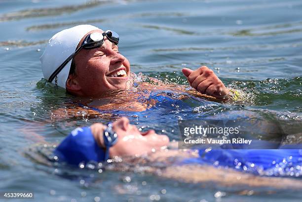 Josee Santillan of Canada celebrates 2nd place in the Women's 35-39 Age Group 3km swim during the 15th FINA World Masters Championships at Parc...