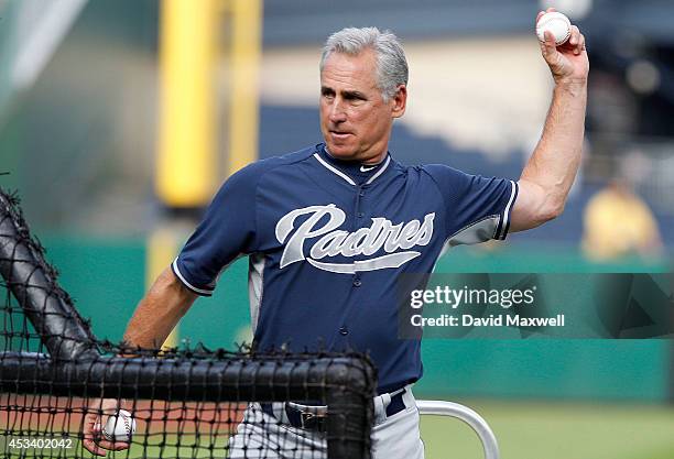 San Diego Padres Manager Bud Black throws a pitch during batting practice before the game against the Pittsburgh Pirates on August 9, 2014 at PNC...