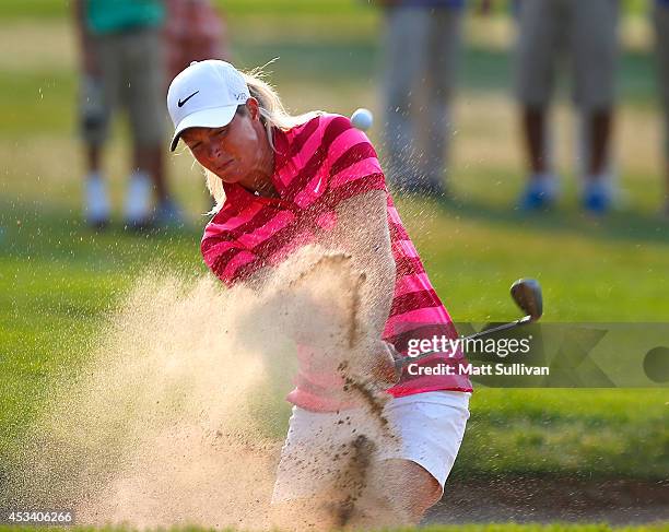 Suzann Pettersen of Norway hits her third shot on the 18th hole during the third round of the Meijer LPGA Classic at Blythefield Country Club on...