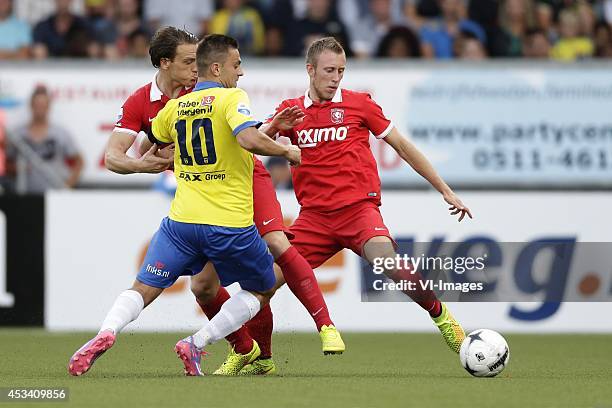 Robbert Schilder of FC Twente, Dejan Meleg of Cambuur Leeuwarden, Dico Koppers of FC Twente during the Dutch Eredivisie match between SC Cambuur...