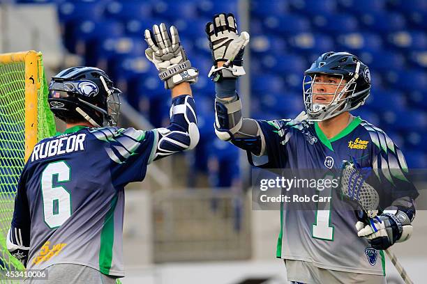 Joe Walters and Ben Rubeor of the Chesapeake Bayhawks celebrate a first half goal against the Charlotte Hounds at Navy-Marine Corps Memorial Stadium...