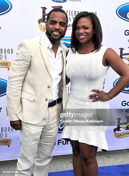 Todd Tucker and TV personality Kandi Burruss attend the 2014 Ford Neighborhood Awards Hosted By Steve Harvey at the Phillips Arena on August 9, 2014...