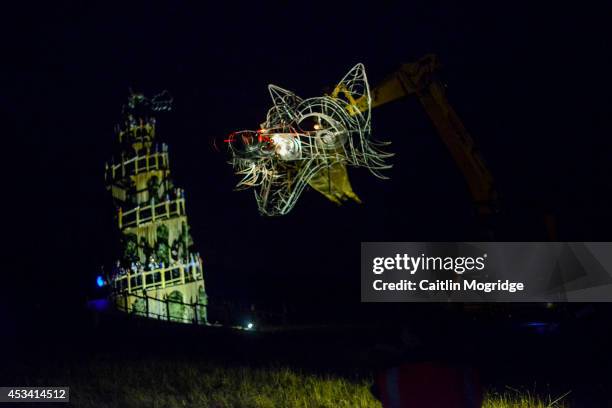 The fire procession on day 3 of Wilderness Festival at Cornbury Park on August 9, 2014 in Oxford, United Kingdom.