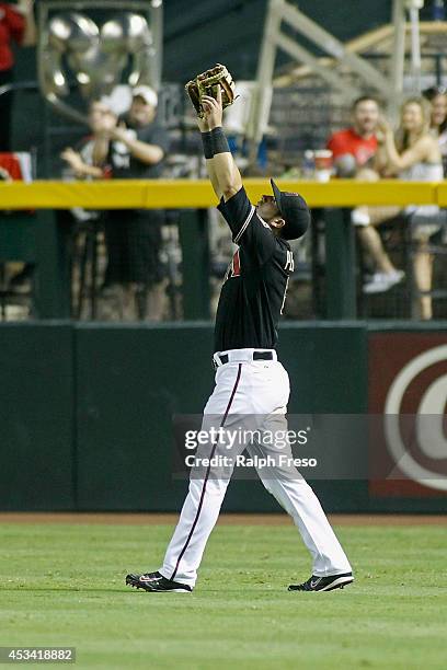 David Peralta of the Arizona Diamondbacks celebrates after making the game ending catch against the Colorado Rockies during the ninth inning of a MLB...