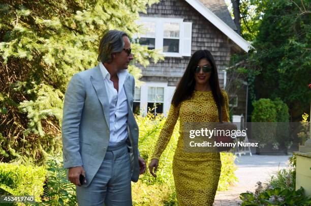 Frederic Marq and Adriana de Moura seen on August 9 in Bridgehampton, New York.