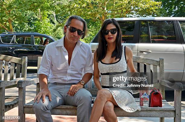 Frederic Marq and Adriana de Moura seen on August 9 in Bridgehampton, New York.