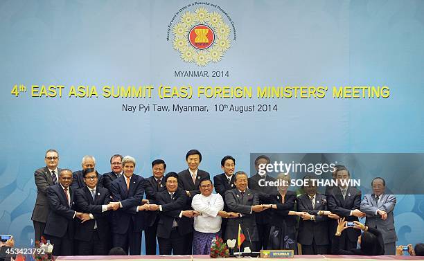 Singapore Foreign Minister K Shanmugam, Thai foreign affairs ministry permanent secretary Sihasak Phuangketkeow, US Secretary of State John Kerry,...