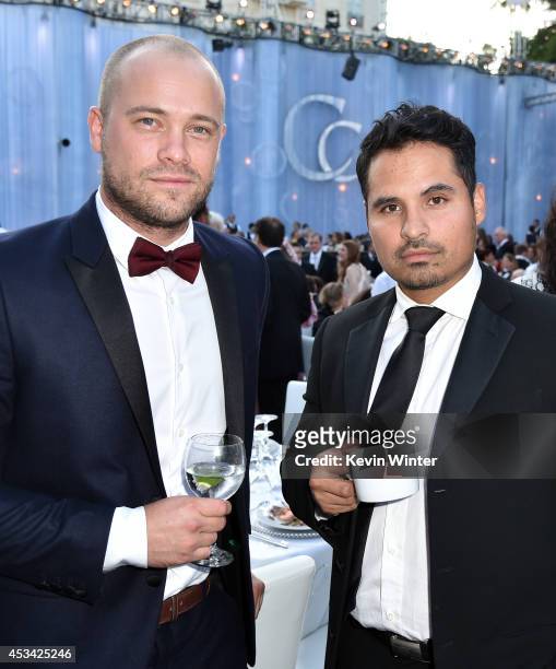 Player Trevor Bell and actor Michael Pena attend the Church of Scientology Celebrity Centre 45th Anniversary Gala on August 9, 2014 in Los Angeles,...