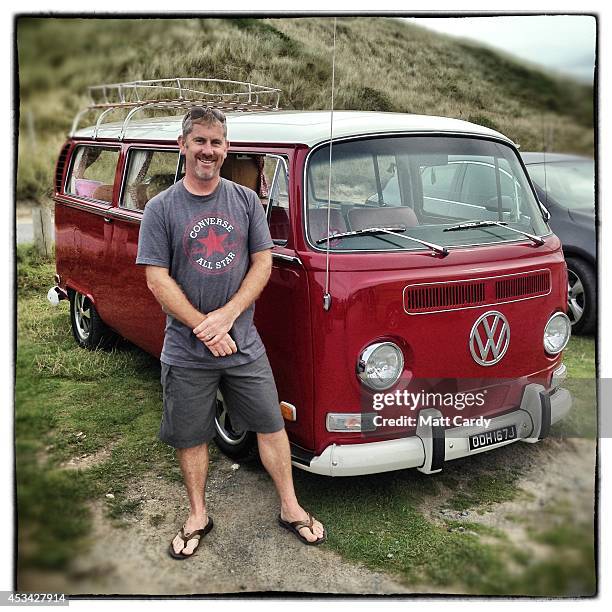 Graham Snodden from Chesterfield poses for a photograph besides his 1971 early second generation or T2, bay window Volkswagen Transporter van near...