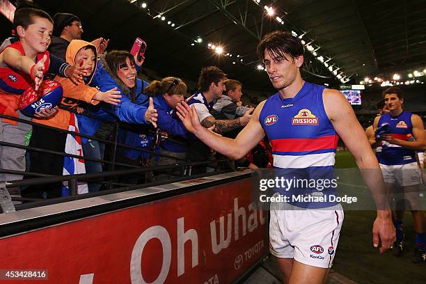 Ryan Griffen of the Bulldogs celebrates the win with fans during the round 20 AFL match between the St Kilda Saints and the Western Bulldogs at...