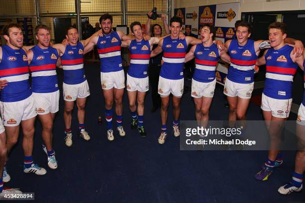 Bulldogs players celebrate their win during the round 20 AFL match between the St Kilda Saints and the Western Bulldogs at Etihad Stadium on August...