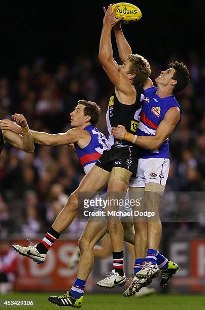 Rhys Stanley of the Saints marks the ball against Mark Austin of the Bulldogs during the round 20 AFL match between the St Kilda Saints and the...