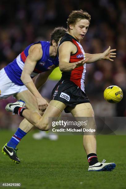 Jack Billings of the Saints kicks a goal during the round 20 AFL match between the St Kilda Saints and the Western Bulldogs at Etihad Stadium on...