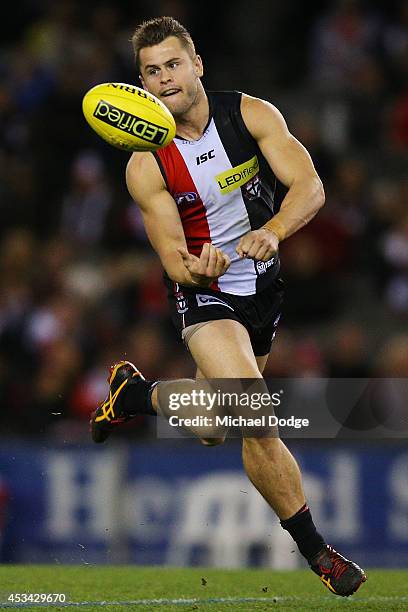 Maverick Weller of the Saints handballs during the round 20 AFL match between the St Kilda Saints and the Western Bulldogs at Etihad Stadium on...