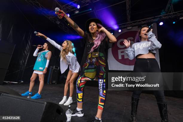 Shereen Cutkelvin, Jess Plummer and Asami Zdrenka and Amira McCarthy of Neon Jungle performs at Osfest on August 9, 2014 in Oswestry, England.