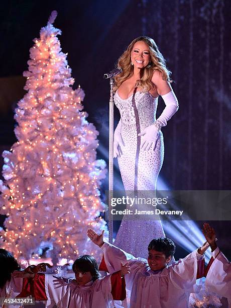 Mariah Carey performs at the 81st Annual Rockefeller Center Christmas Tree Lighting Pre-Tape at Rockefeller Center on December 3, 2013 in New York...