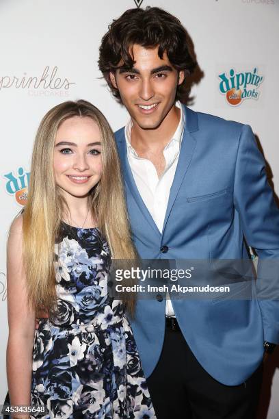 Actor Blake Michael and actress Sabrina Carpenter attend Blake Michael's 18th Birthday at Riviera 31 on August 9, 2014 in Beverly Hills, California.