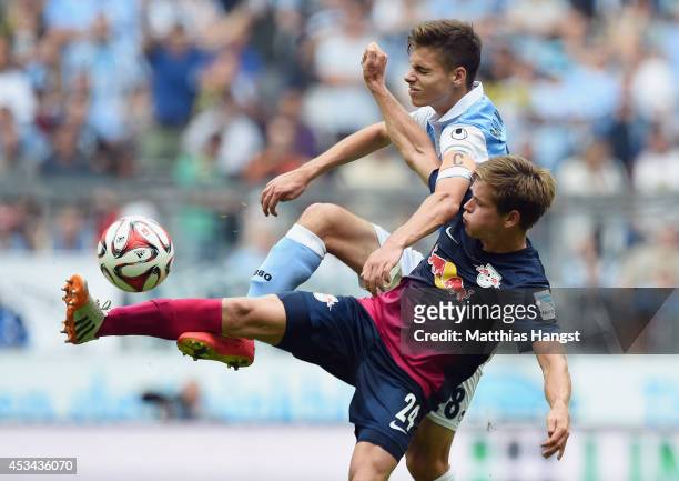 Julian Weigl of 1860 Muenchen in action against Dominik Kaiser of RB Leipzig during the Second Bundesliga match between TSV 1860 Muenchen and RB...