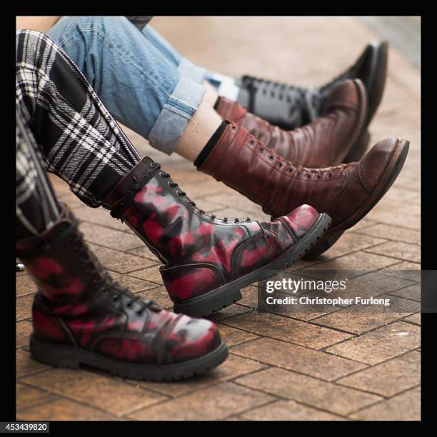 Punks show off the Doctor Marten boots as they gather in Blackpool for the annual Rebellion Punk Rock Festival on August 8, 2014 in Blackpool,...