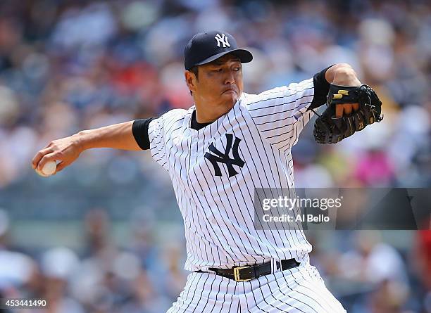 Hiroki Kuroda of the New York Yankees pitches against the Cleveland Indians during their game at Yankee Stadium on August 10, 2014 in the Bronx...