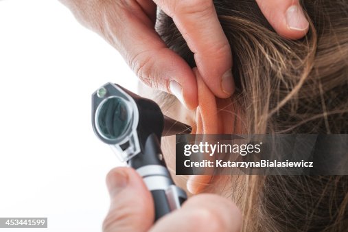 Ear Observer Examining Ear With Otoscope High-Res Stock Photo - Getty Images