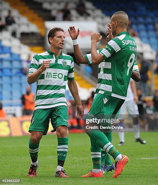 Adrian Silva of Sporting Clube de Portugal celebrates after scoring his team's opening goal during the Teresa Herrera Trophy match between Sporting...