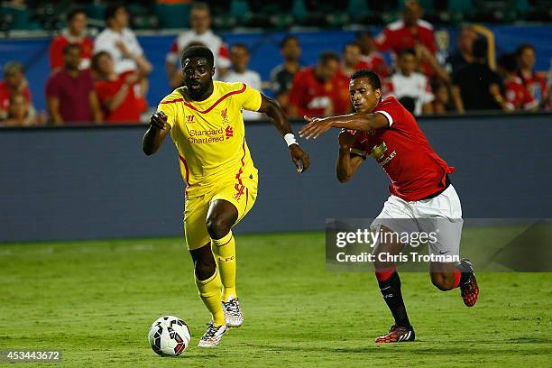 Kolo Toure of Liverpool is challenged by Nani of Manchester United in the Guinness International Champions Cup 2014 Final at Sun Life Stadium on...