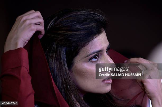 Former Foreign Minister of Pakistan, Hina Rabbani Khar gestures during the media event 'Agenda', oraganised by a television channel in New Delhi on...