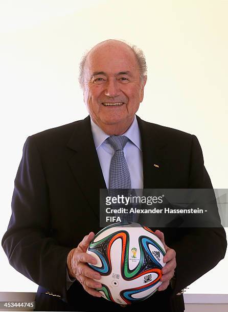 President Joseph S. Blatter poses with a adidas brazuca, the Official Match Ball for the 2014 FIFA World Cup Brazil at Costa do Sauipe Resort on...