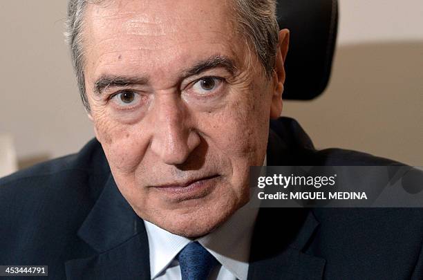 Jacques Pelissard, MP of the Union for a Popular Movement and president of the French mayors association poses, on December 4, 2013 in Paris. AFP...