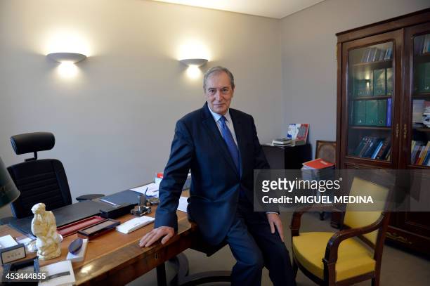Jacques Pelissard, MP of the Union for a Popular Movement and president of the French mayors association poses, on December 4, 2013 in Paris. AFP...
