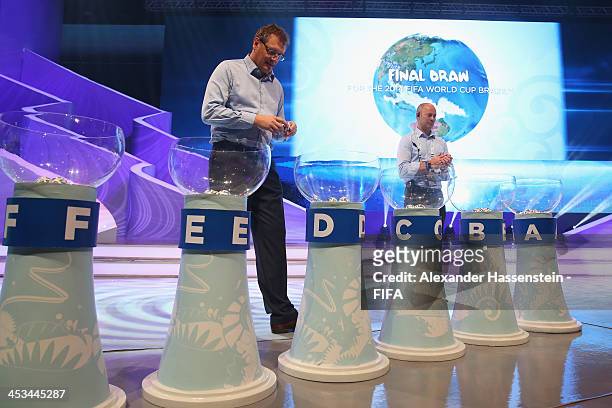 Secretary General Jerome Valcke checks the draw balls during a rehearsal for the Final Draw of the FIFA World Cup 2014 at Costa do Sauipe Resort on...