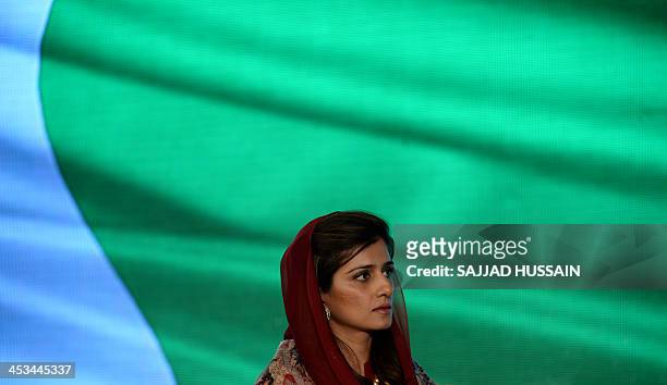 Former Foreign Minister of Pakistan, Hina Rabbani Khar listens to a question during the media event 'Agenda', oraganised by a television channel in...