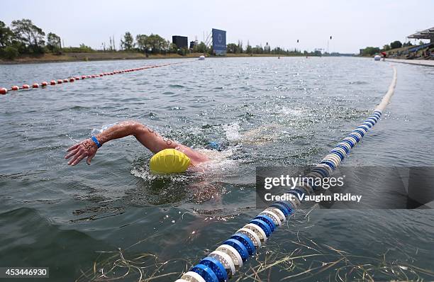 Mark Sandt of the U.S. Competes in the Men's 50-54 Age Group 3km swim during the 15th FINA World Masters Championships at Parc Jean-Drapeau on August...