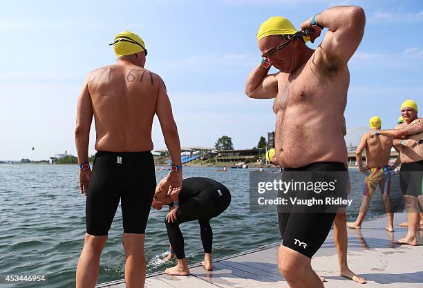 Timothy Waud of the U.S. Competes in the Men's 45-49 Age Group 3km swim during the 15th FINA World Masters Championships at Parc Jean-Drapeau on...