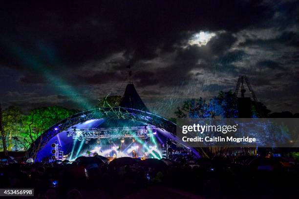 The full moon over the mainstage on the final night of Wilderness Festival at Cornbury Park on August 10, 2014 in Oxford, United Kingdom.