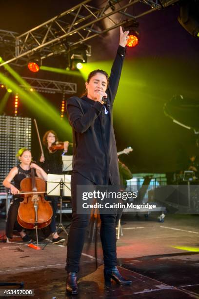 Jessie Ware performs on stage at Wilderness Festival at Cornbury Park on August 10, 2014 in Oxford, United Kingdom.