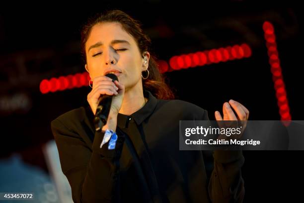 Jessie Ware performs on stage at Wilderness Festival at Cornbury Park on August 10, 2014 in Oxford, United Kingdom.