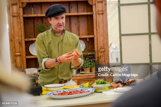 Chef hosts a cookery class at Wilderness Festival at Cornbury Park on August 10, 2014 in Oxford, United Kingdom.