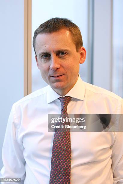 Dmitry Konyaev, chief executive officer of OAO Uralchem, poses for a photograph in his office at the company's headquartersl in Moscow, Russia, on...
