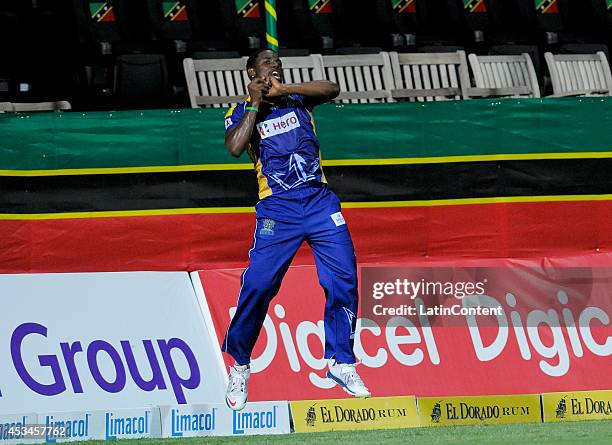 Raymon Reifer of Barbados Tridents takes the catch to dismiss Rusty Theron of Jamaica Tallawahs during a match between Barbados Tridents and Jamaica...