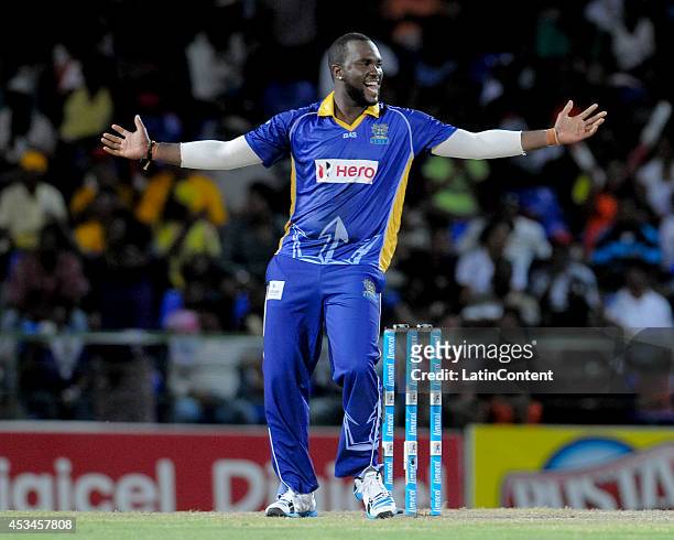 Ashley Nurse of Barbados Tridents celebrate the dismissal of Daniel Vettori of Jamaica Tallawahs during a match between Barbados Tridents and Jamaica...